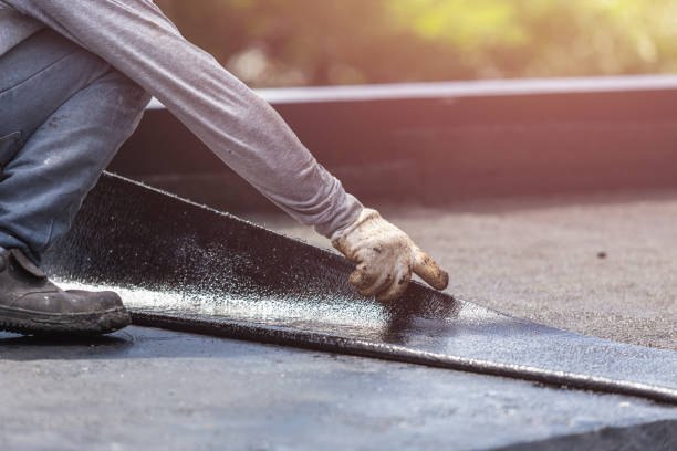 Professional Emergency Waterproofing technician working in Sayville, NY